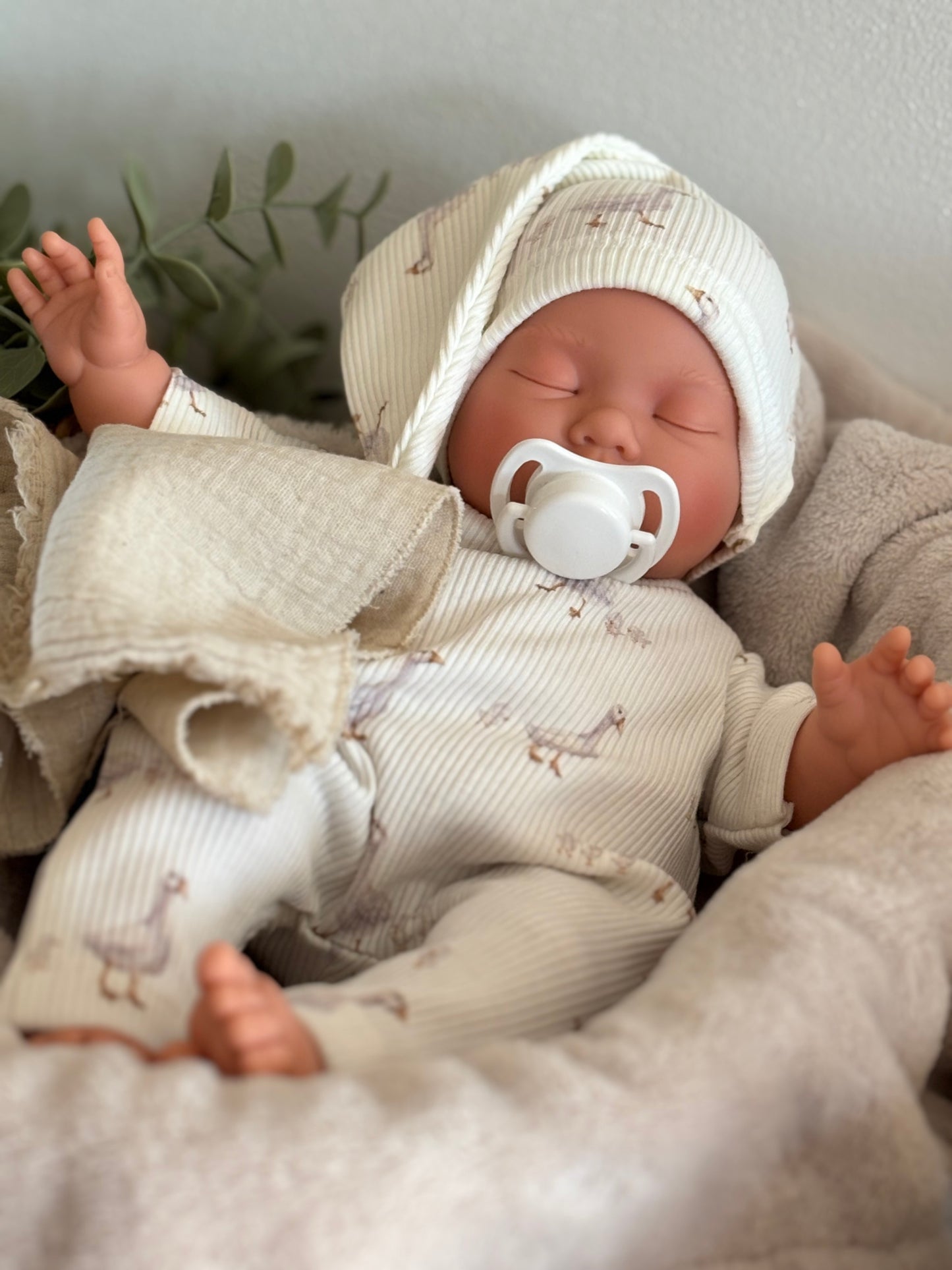 Poussin dormeur oies bonnet