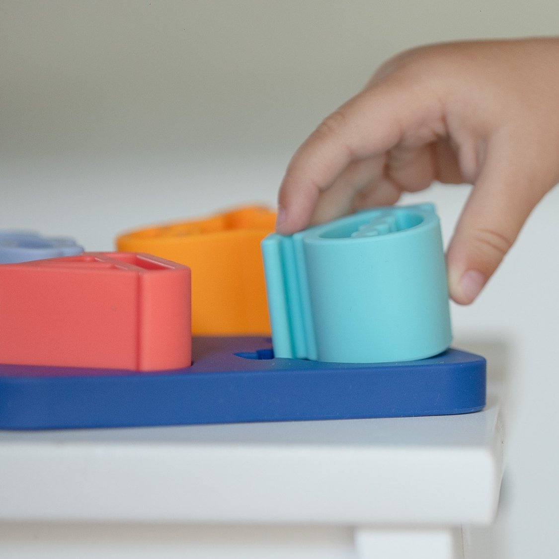 Jouets d'éveil en silicone - Puzzle les engins